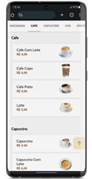 Smartphone exibindo menu de aplicativo de cafeteria com opções de bebidas sob as categorias ‘Café’ e ‘Cápsulas’, cada uma com imagens e preços em reais.